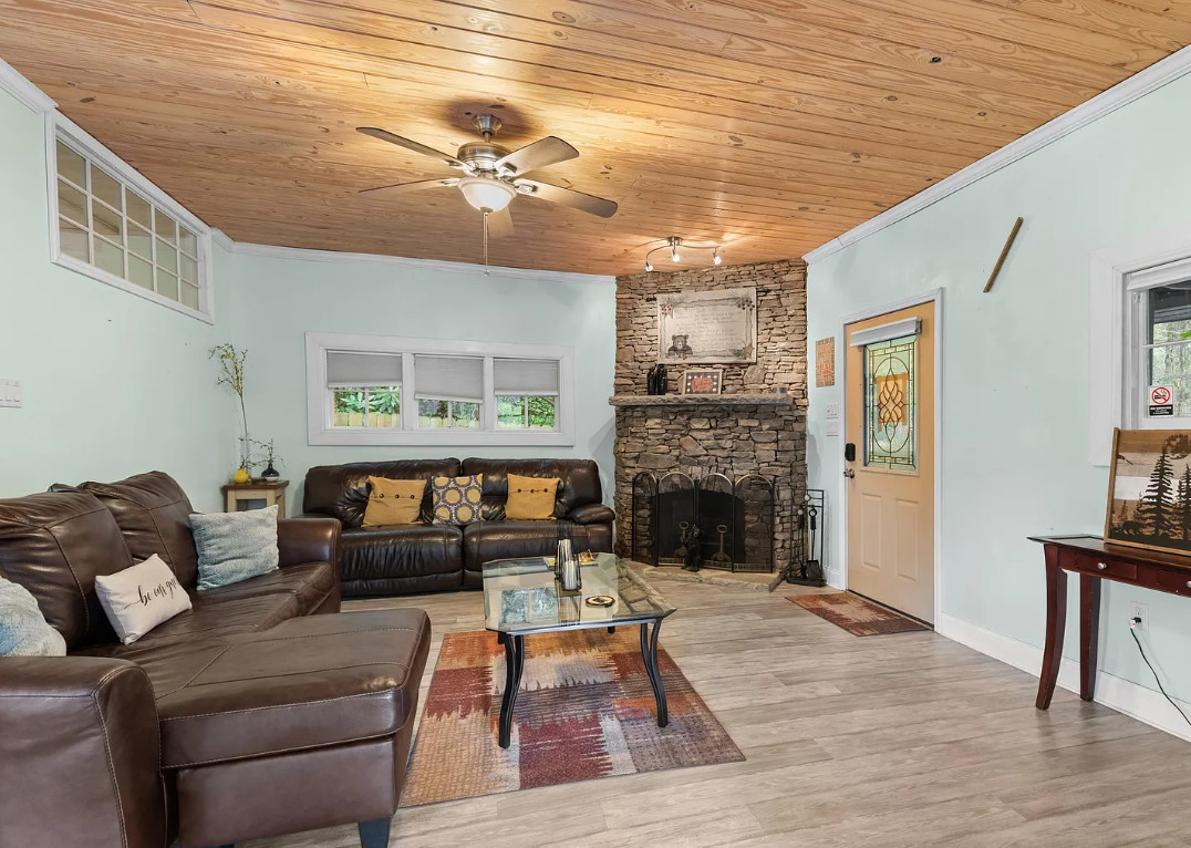 Like a treehouse! Overlooks the Little River in Tennessee. Furnished. $345,000