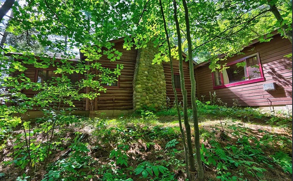 Pretty setting! Has a guest cabin! On 13 acres in Wisconsin. $499,900