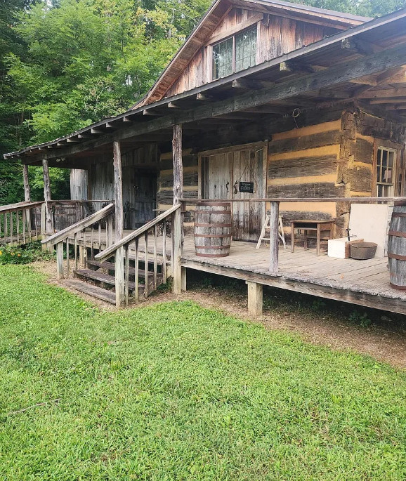 OMG! I want this village! That old chapel is so cool! Ten cabins on 22 acres in Kentucky. $350,000