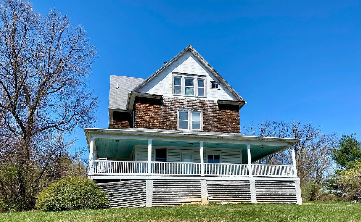 8 bedrooms and 5 bathrooms. C. 1904. Three acres in Maryland. $385,000