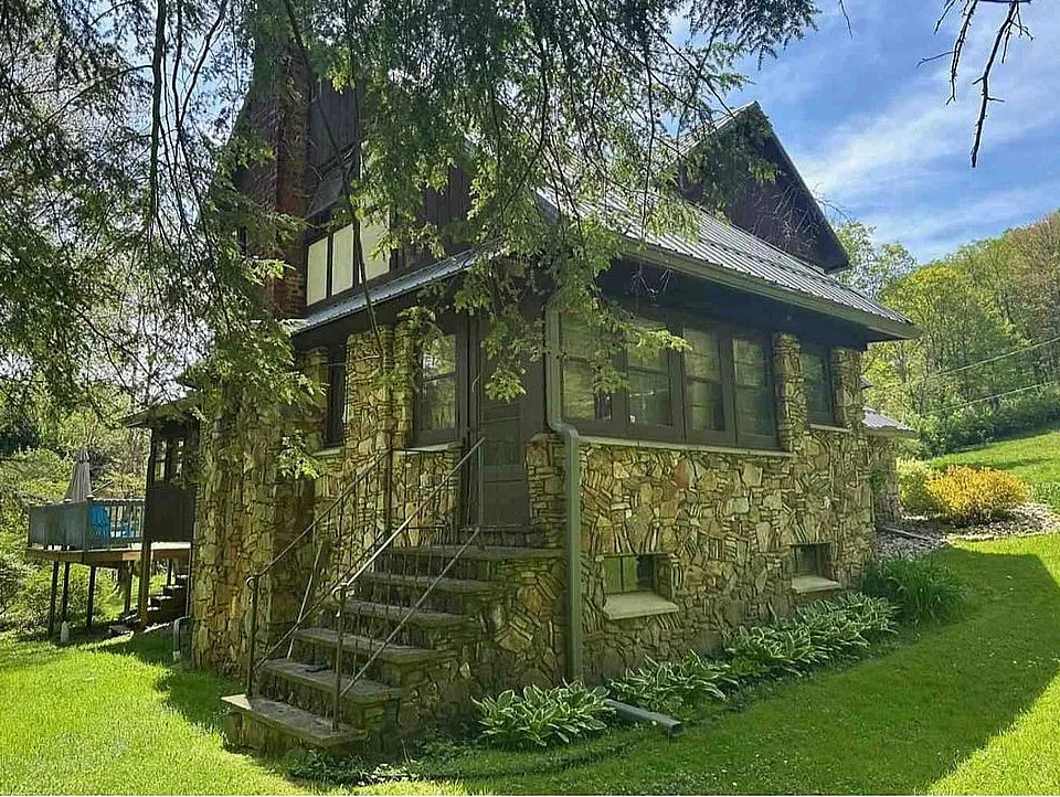 This Tudor style home is pretty! Circa 1920. Three acres in Pennsylvania. $275,000