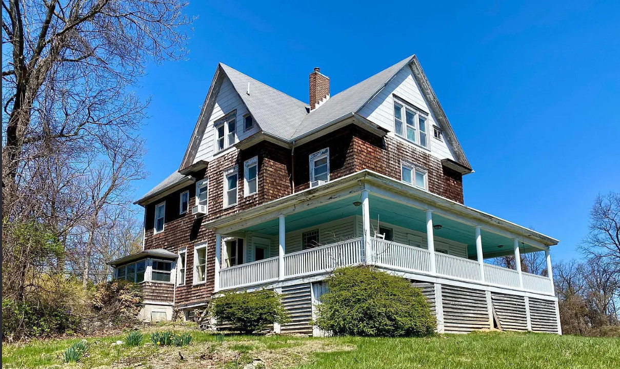 8 bedrooms and 5 bathrooms. C. 1904. Three acres in Maryland. $385,000