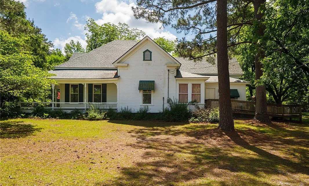 On 18 acres in North Carolina! Love the stained glass front door! $230,000