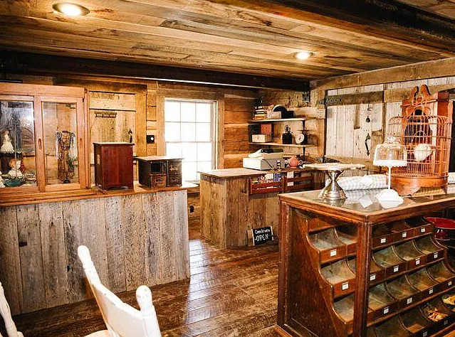 OMG! I want this village! That old chapel is so cool! Ten cabins on 22 acres in Kentucky. $350,000