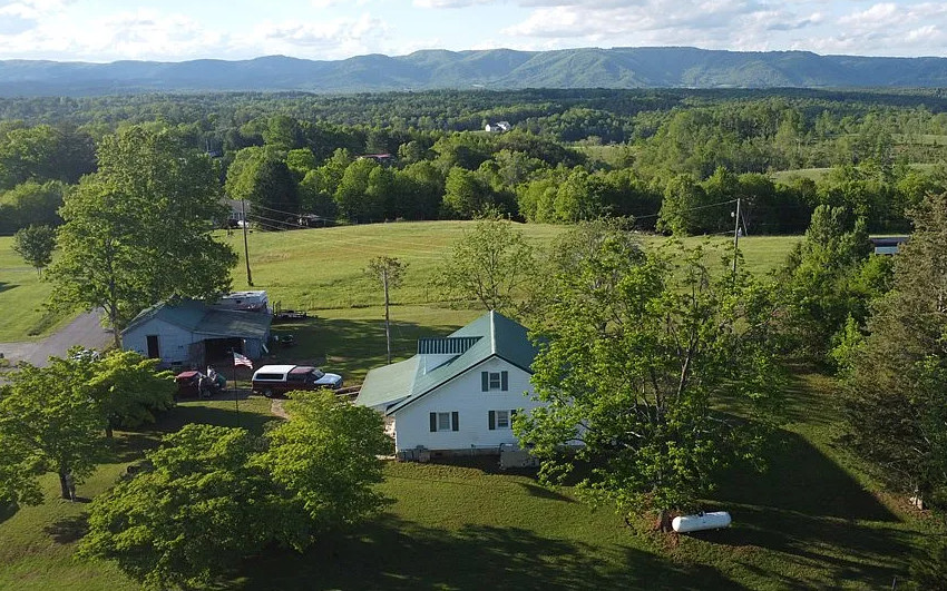 Pretty setting! Ten minutes to Mt. Airy, NC. Over an acre in Virginia. $172,500