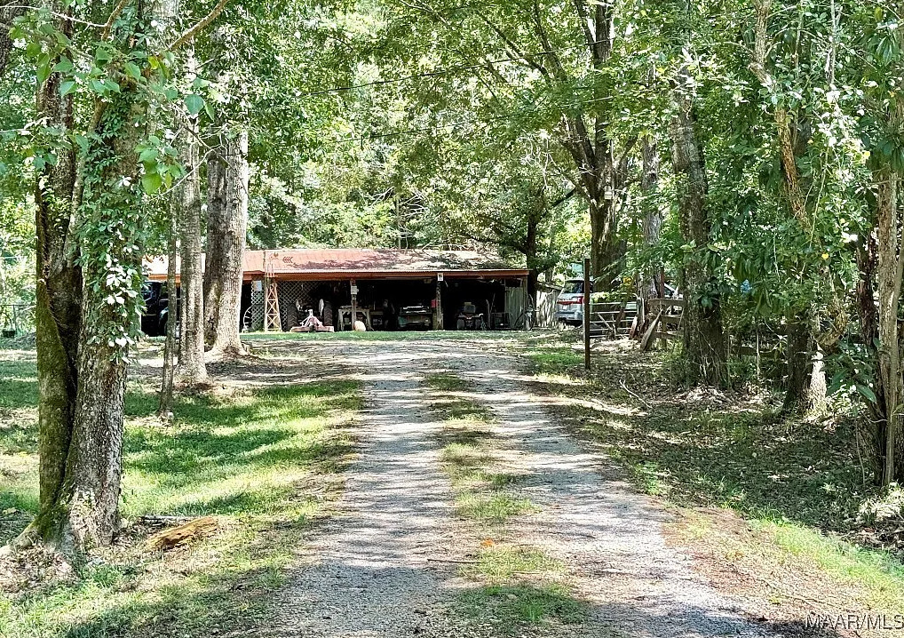 Pretty setting! On 20 acres in Alabama. Has a pond! $279,000