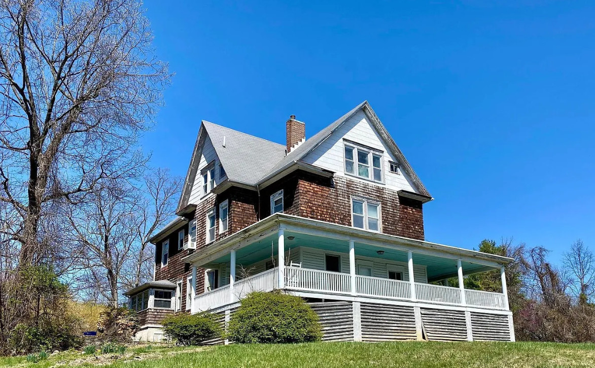 8 bedrooms and 5 bathrooms. C. 1904. Three acres in Maryland. $385,000