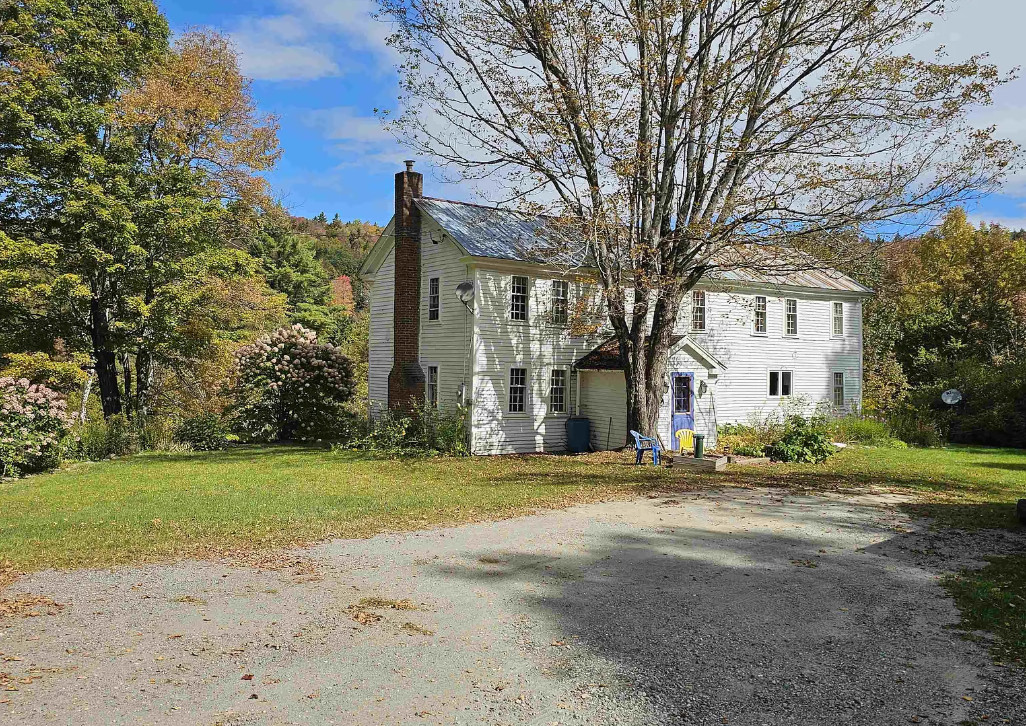 Pretty setting! Pretty floors! Has a guest apartment! Five acres in Vermont. $549,000