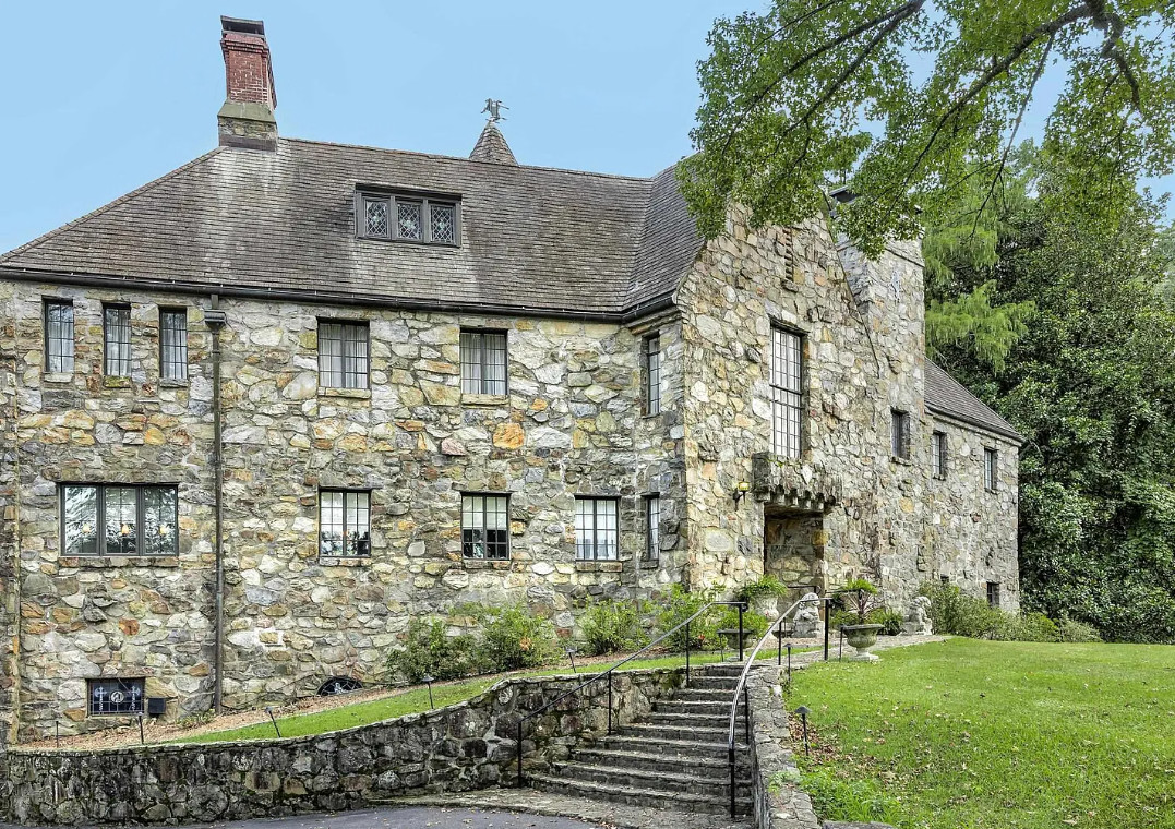 A castle in Arkansas! 9,000 square feet! The bar is so cool! 95 acres. $3,800,000