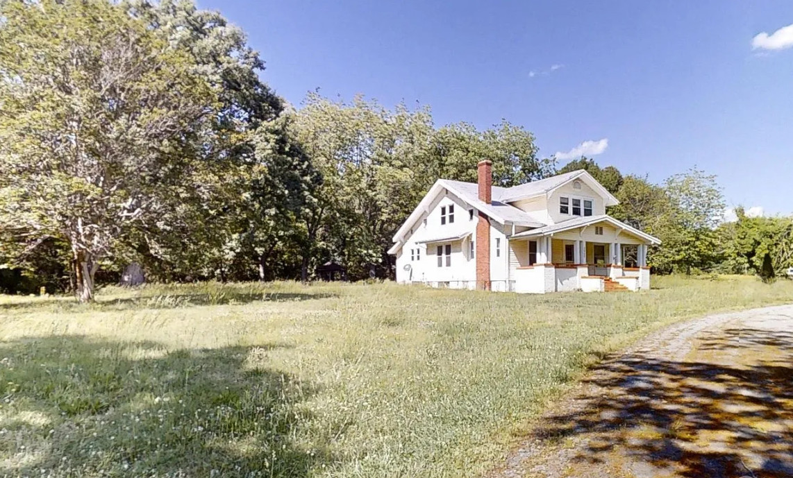 So much potential! Circa 1921. Over seven acres in North Carolina. $350,000