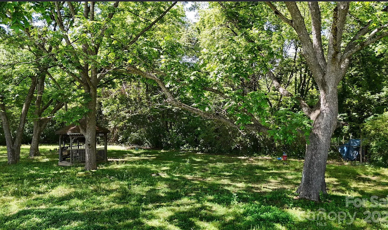 So much potential! Circa 1921. Over seven acres in North Carolina. $350,000