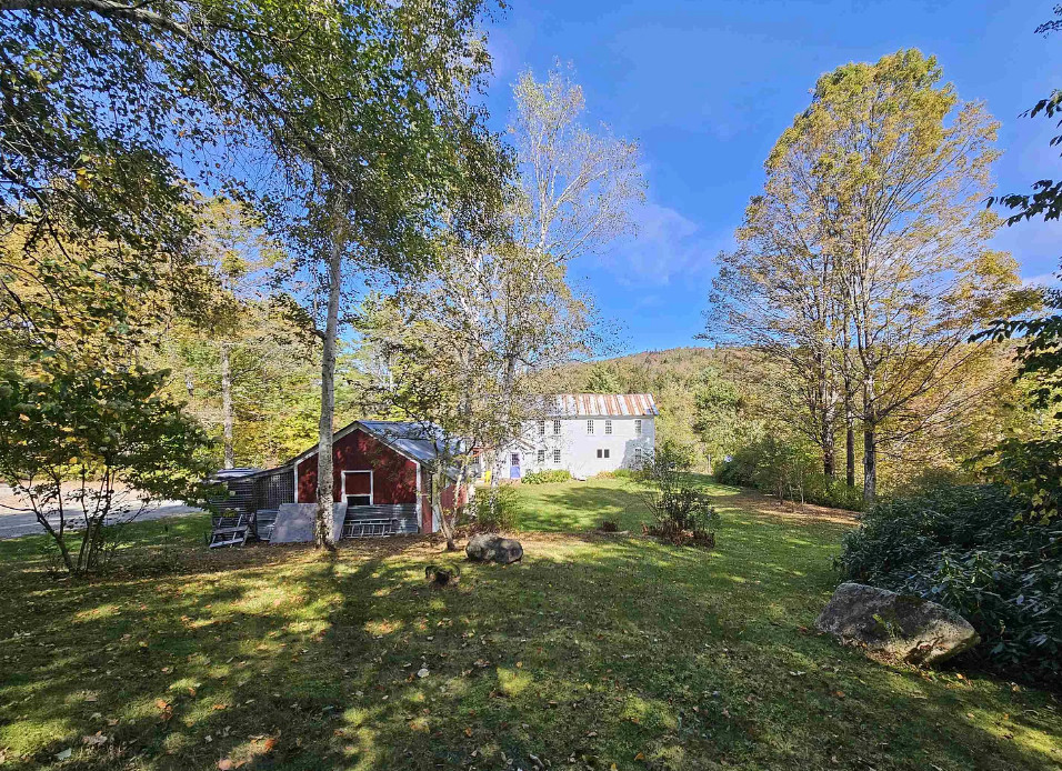 Pretty setting! Pretty floors! Has a guest apartment! Five acres in Vermont. $549,000