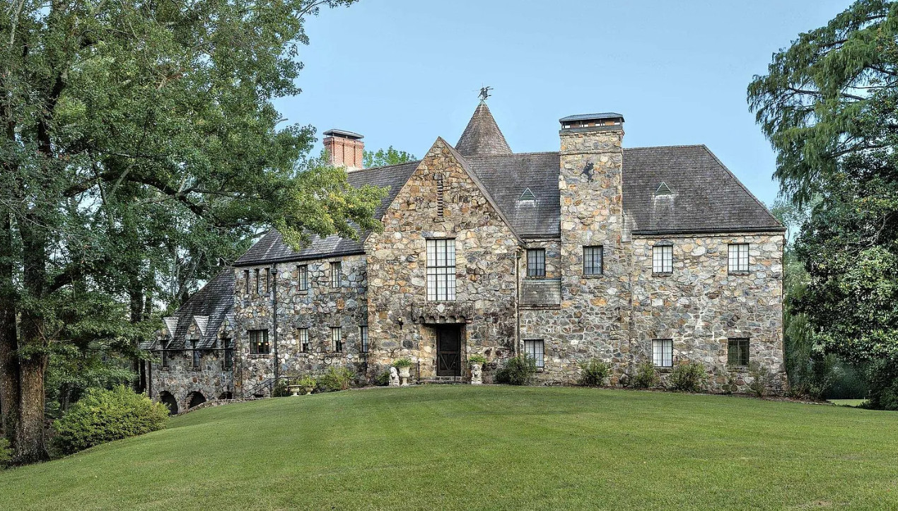A castle in Arkansas! 9,000 square feet! The bar is so cool! 95 acres. $3,800,000
