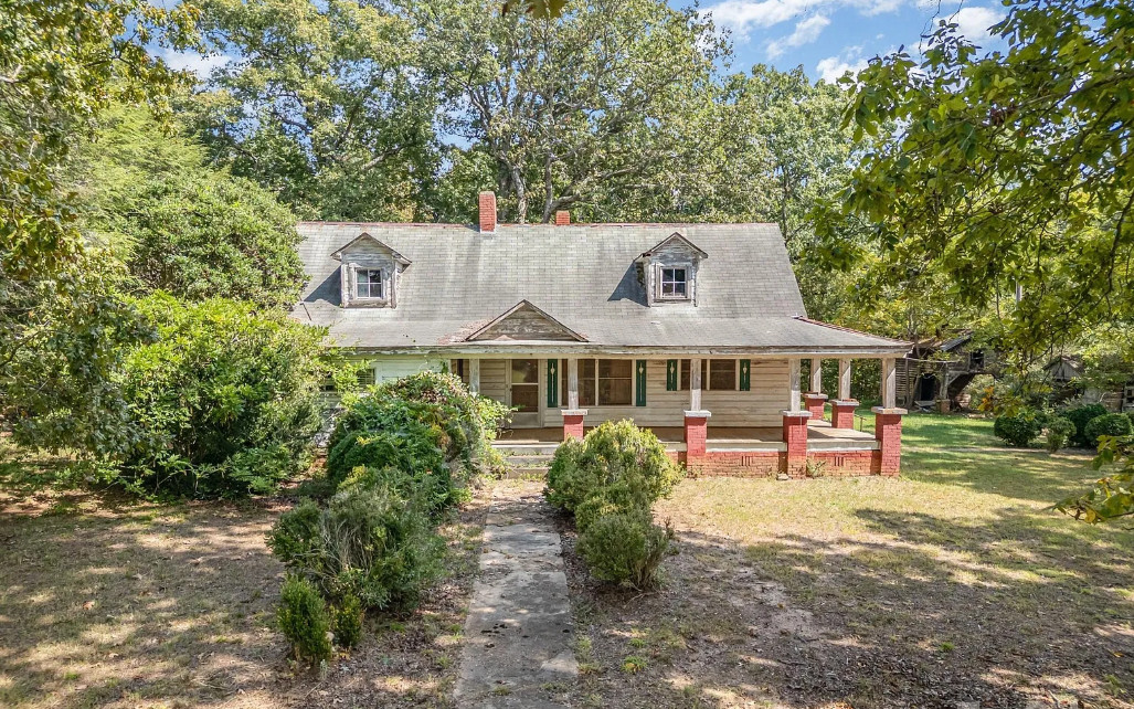 Eight acres! Fixer upper alert in North Carolina. $112,000