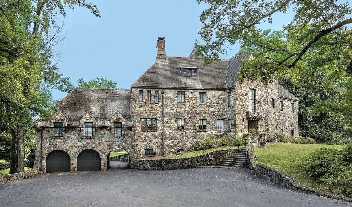 A castle in Arkansas! 9,000 square feet! The bar is so cool! 95 acres. $3,800,000