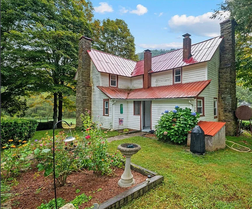 Stocked trout stream! Over seven acres in the NC mountains. $374,900