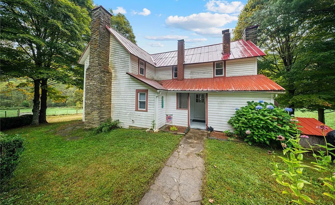 Stocked trout stream! Over seven acres in the NC mountains. $374,900