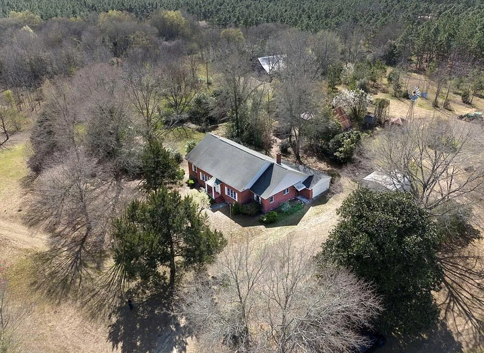 Multiple outbuildings! Five acres in Georgia. $234,000
