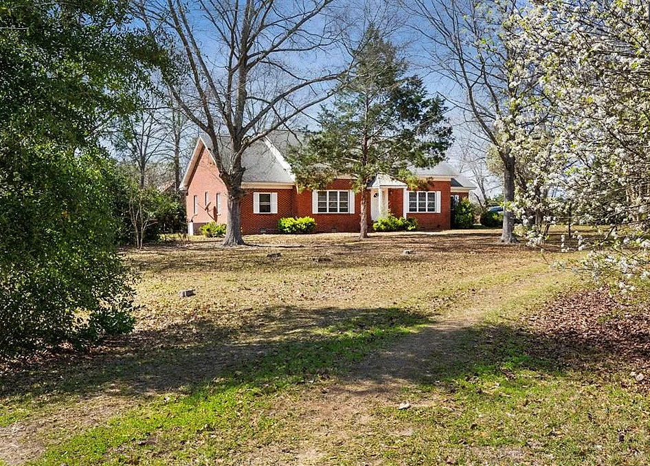 Multiple outbuildings! Five acres in Georgia. $234,000