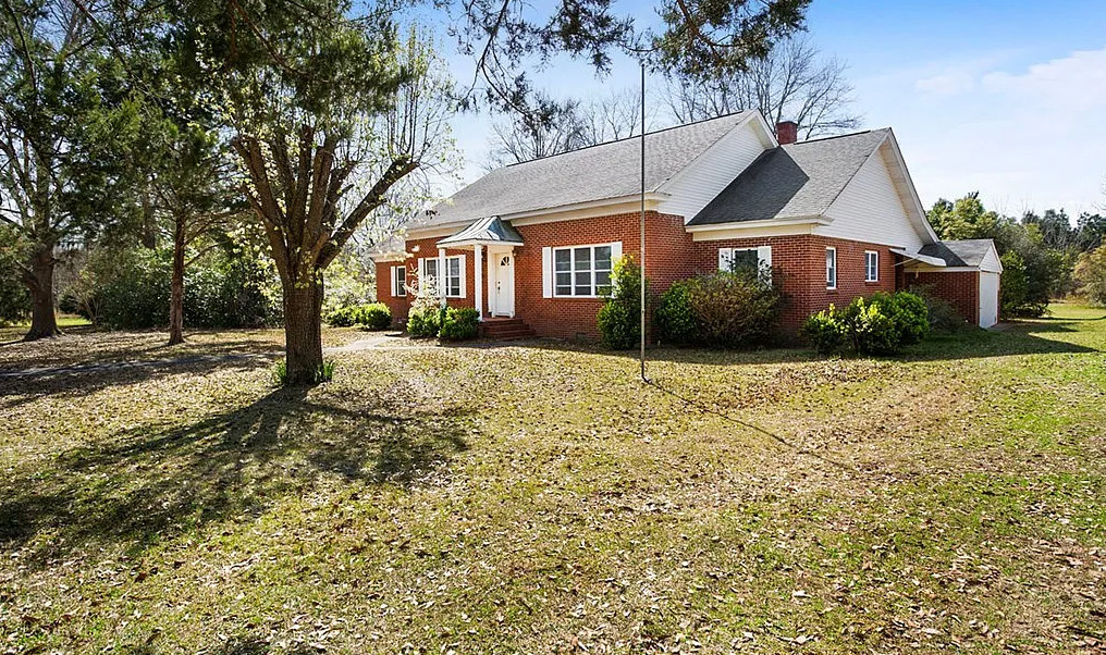 Multiple outbuildings! Five acres in Georgia. $234,000