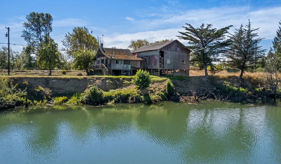 Rustic river cabin in Oregon. Circa 1915. Two acres. $250,000