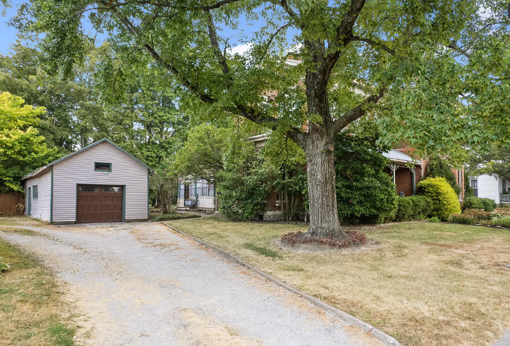 Love the chimneys and the woodwork! C. 1877 in Ohio. $274,900