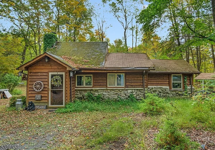 Storybook cottage in the woods! Almost five acres in New Jersey. $299,000