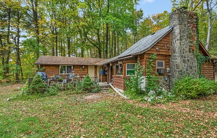 Storybook cottage in the woods! Almost five acres in New Jersey. $299,000