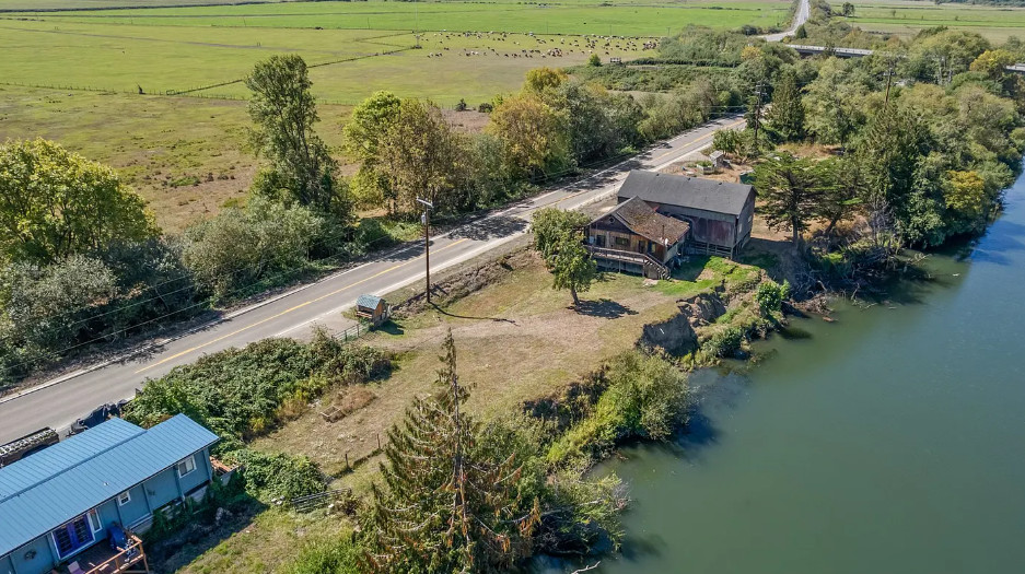 Rustic river cabin in Oregon. Circa 1915. Two acres. $250,000