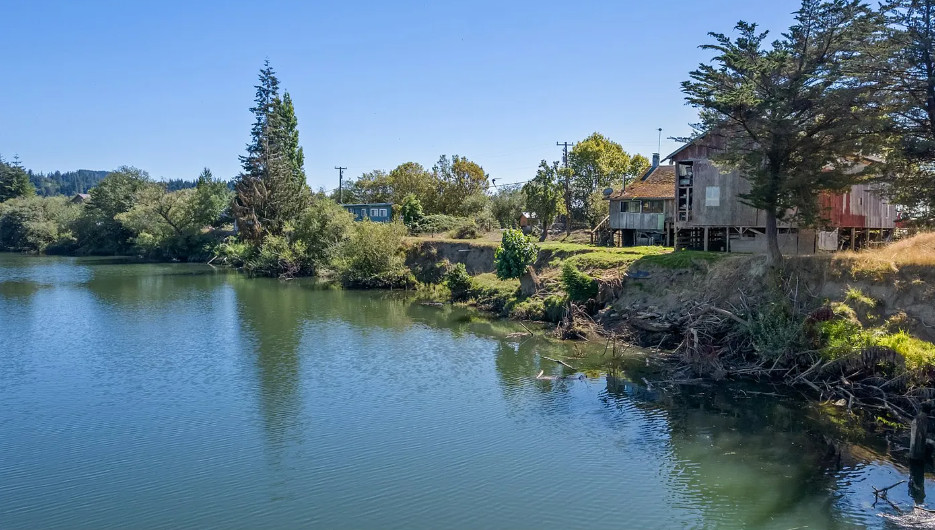Rustic river cabin in Oregon. Circa 1915. Two acres. $250,000