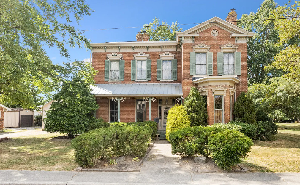 Love the chimneys and the woodwork! C. 1877 in Ohio. $274,900