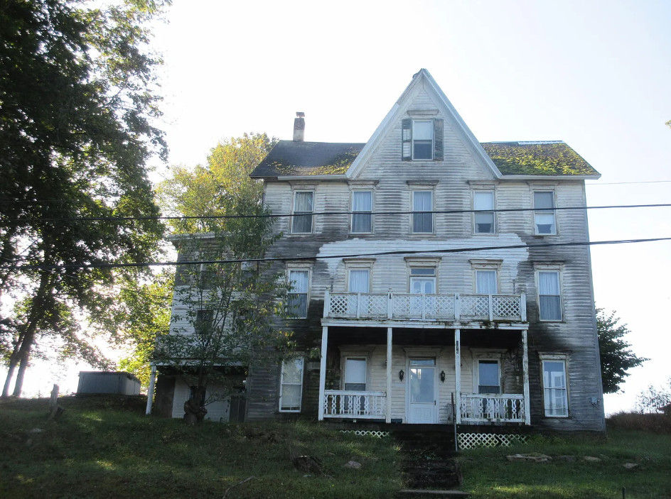 $55,000! Nice staircase and library! Fixer upper alert. Over an acre in Pennsylvania.