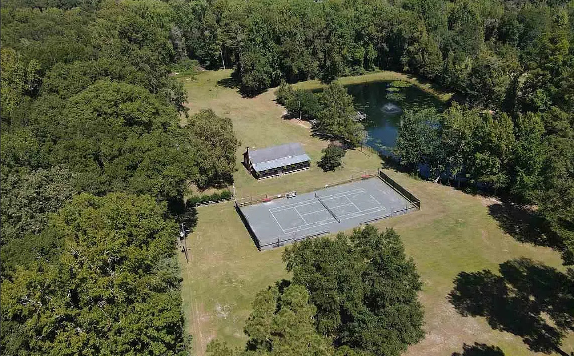Deal of the Day! Has a tennis court! Almost 11 acres in South Carolina. $229,000