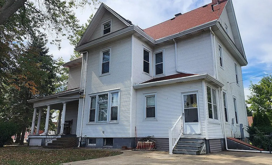 Beautiful pocket doors! A lot of original details! Circa 1898 in Illinois. $219,900