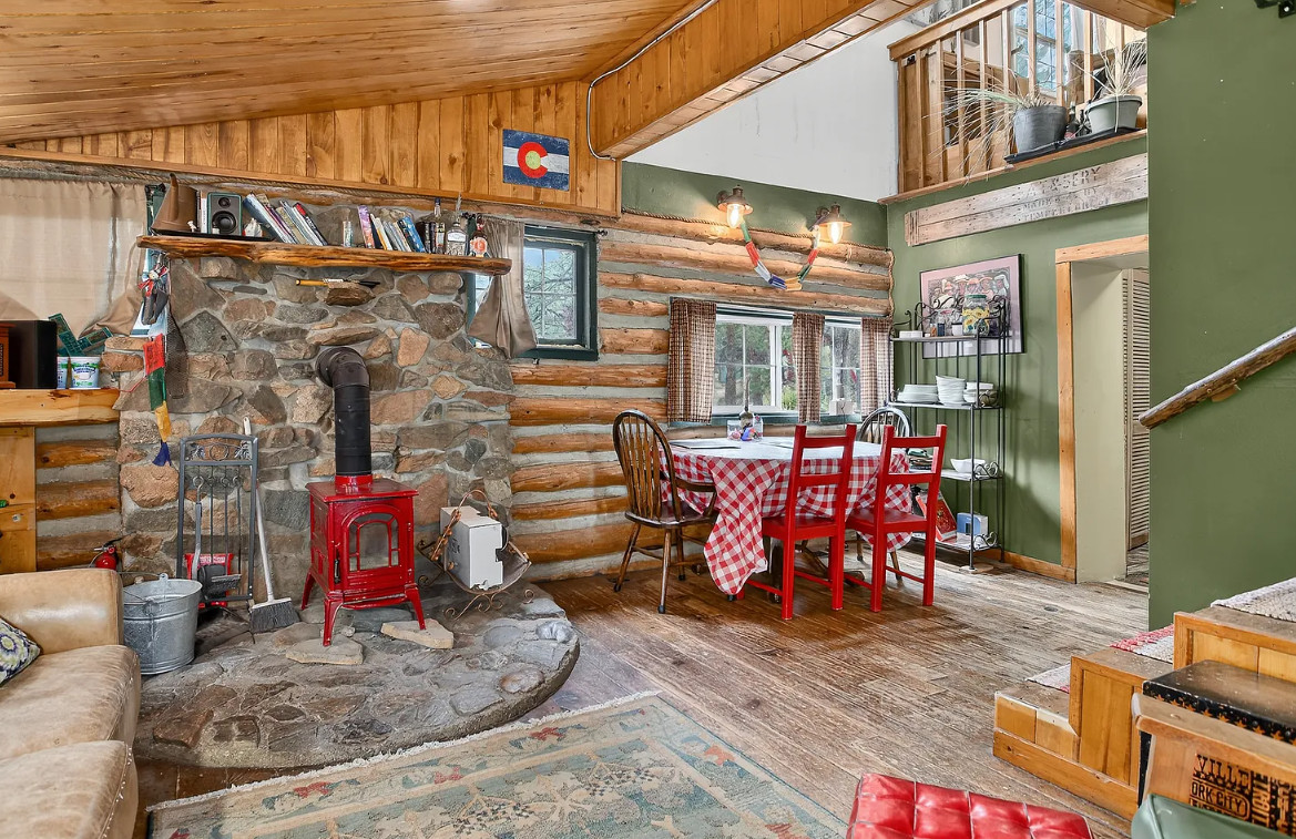 Stove is beautiful! Nice cabin in Colorado. Circa 1905. $389,000
