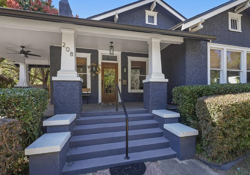 Porch goals! Nice bathrooms! Pretty interior! C. 1910 in Florida. $350,000