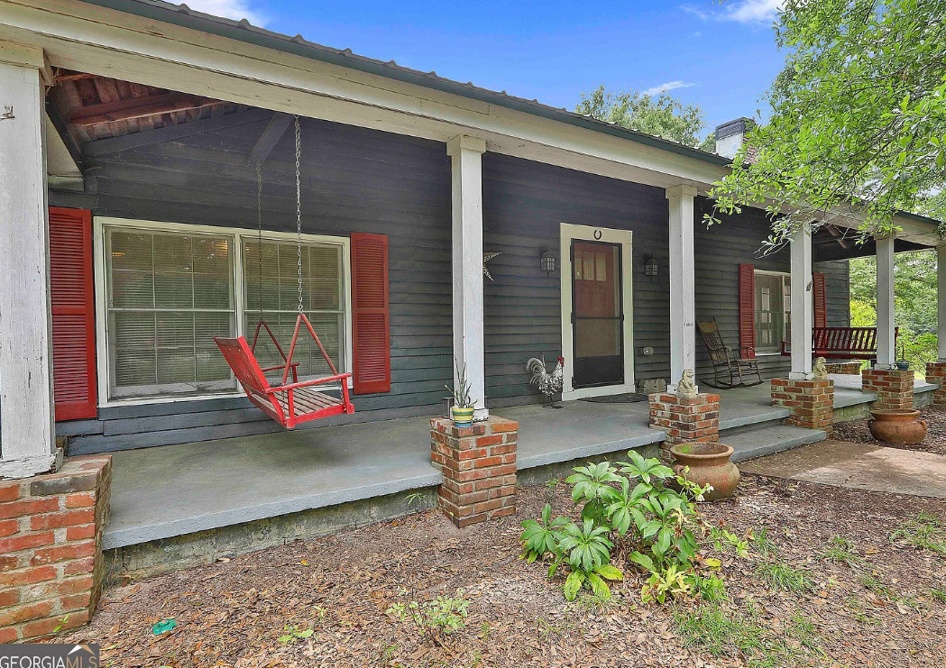 Interesting interior! Two barns! Over four acres in Georgia. $299,900