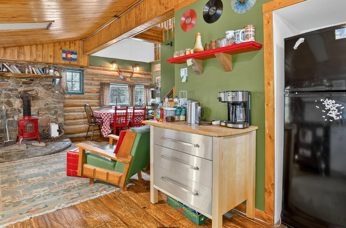 Stove is beautiful! Nice cabin in Colorado. Circa 1905. $389,000