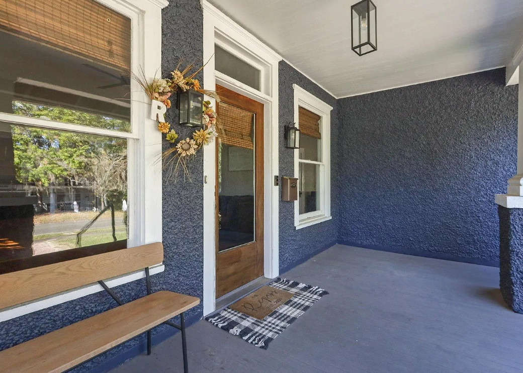 Porch goals! Nice bathrooms! Pretty interior! C. 1910 in Florida. $350,000