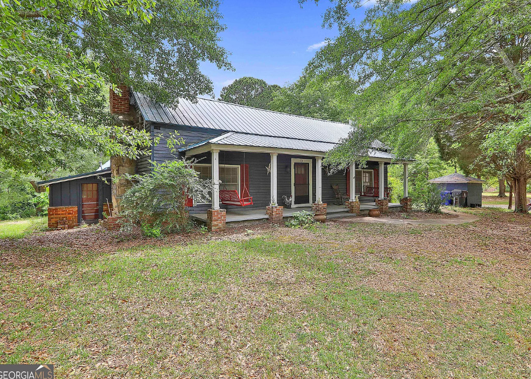 Interesting interior! Two barns! Over four acres in Georgia. $299,900