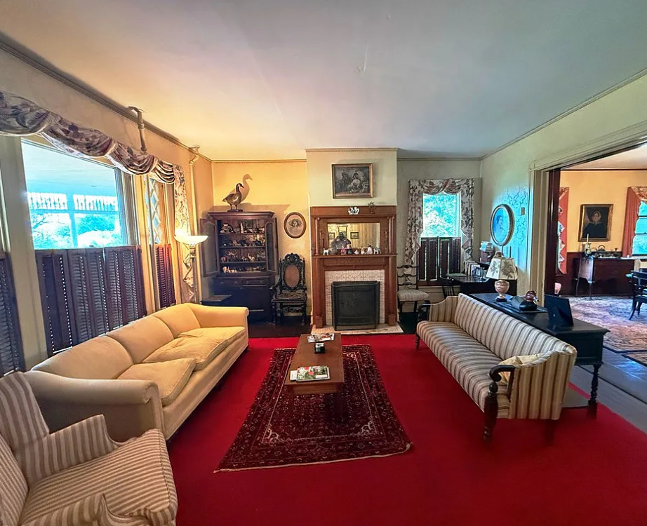 Pretty setting in a lovely town! Over four acres in Virginia. $399,900