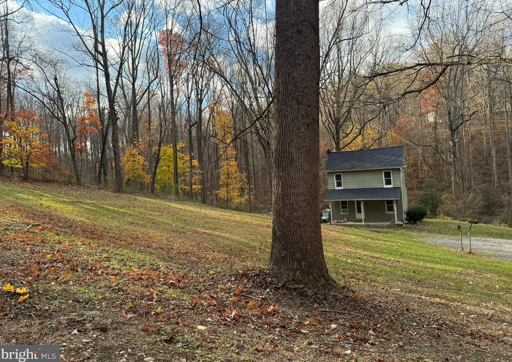 Pretty setting! Over seven acres in Maryland. $299,000
