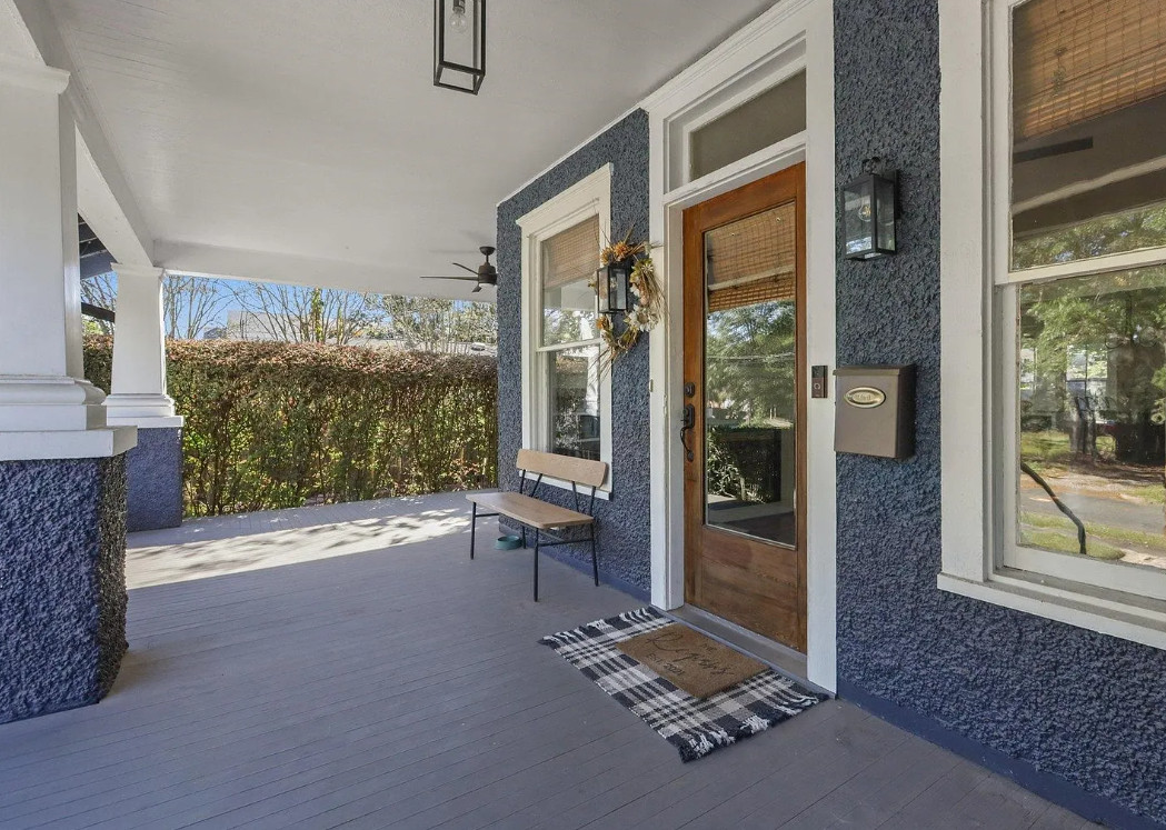Porch goals! Nice bathrooms! Pretty interior! C. 1910 in Florida. $350,000