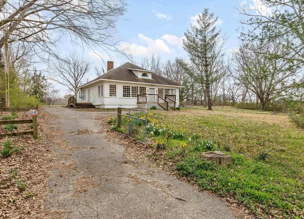 Large sunroom! Almost two acres in Tennessee. Circa 1910. $229,000