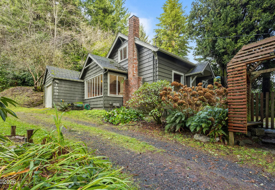 Pretty setting and pretty trees! Over one acre in Oregon. $325,000