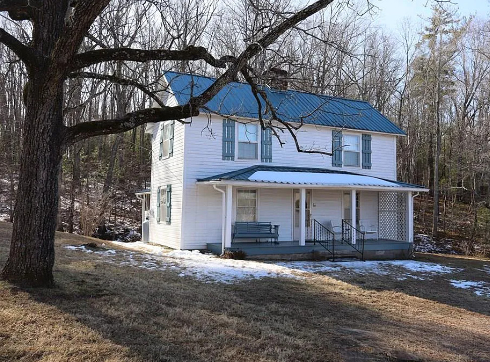 Potential! On 32 acres in Virginia. Nice creek! $325,000