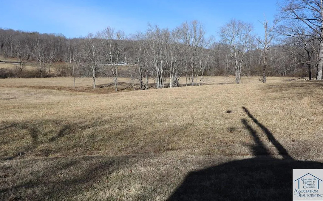 Potential! On 32 acres in Virginia. Nice creek! $325,000