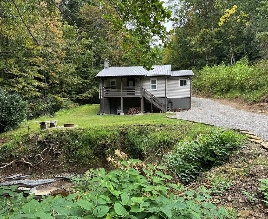 Pretty waterfall! Cute house! On 35 acres in West Virginia. $330,000