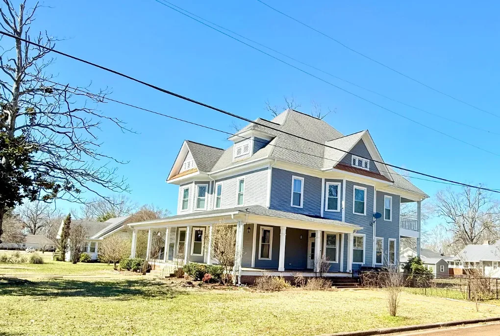 Pretty bathroom and kitchen! Love the outdoor kitchen! C. 1908 in Mississippi. $289,000
