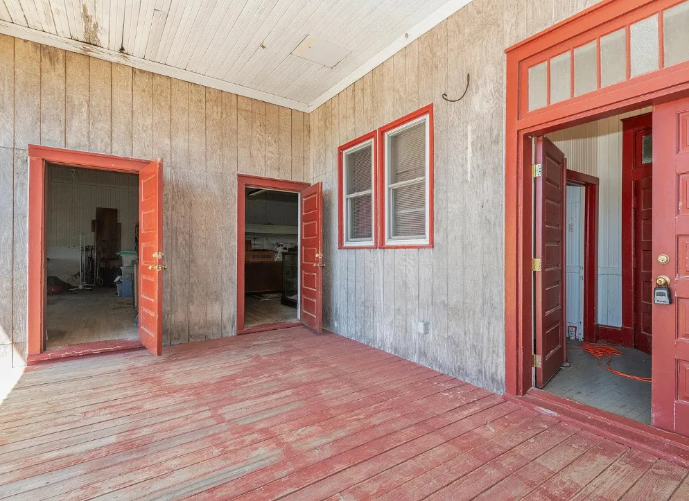 30 minutes to the beach! Former school. Love the stage with original seating! Over two acres in NC. $375,000